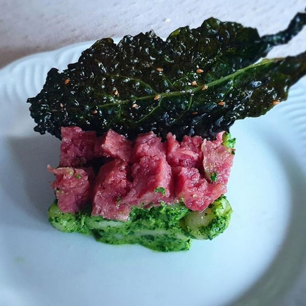 Cotechino Modena IGP with black cabbage pesto and black cabbage chips with sesame